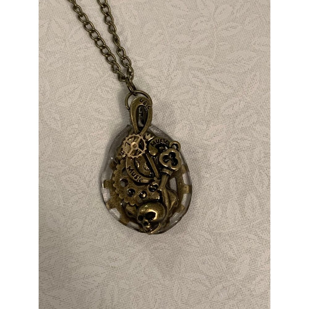 Steampunk Treble Clef Skull necklace Bronze